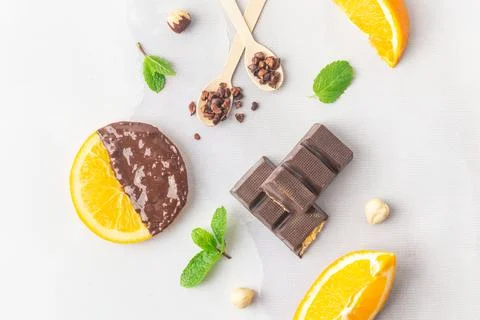 Making candied orange slices dipped in dark chocolate flatlay Stock Photos