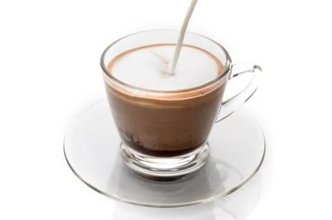 Making cappuccino coffee Stock Photos