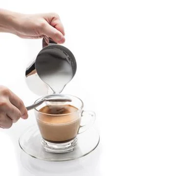 Making cappuccino coffee Stock Photos