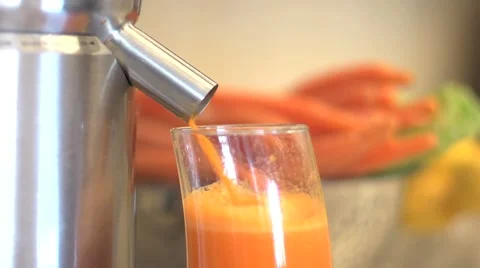Making carrot juice Stock Footage 43444363