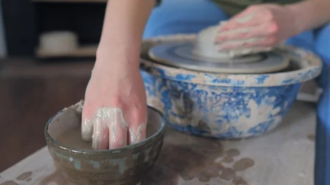 Making ceramic products from white clay Stock Footage 119541896