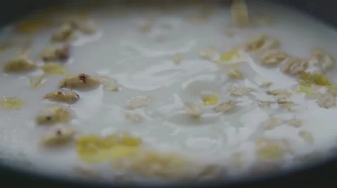 Making cereal in slow motion Stock Footage 57638829