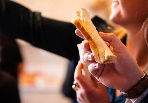 Making cheese rolls iconic new zealand dish cooking grating Stock Photos