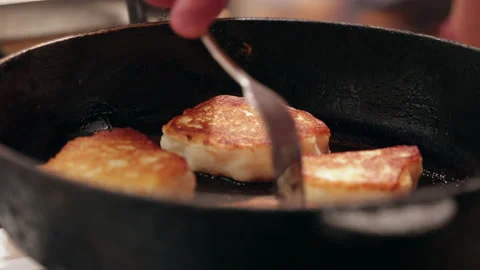 Making A Cheesecake Breakfast Is Cooked In A Frying Pan On A Gas Stove. 60 FPS,  Stock Footage 219487754