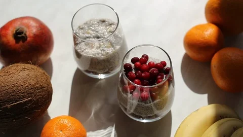 Making chia pudding with cranberries. Stock Footage 128346680