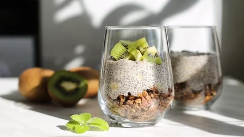 Making chia pudding with kiwi. Stock Footage 128346865