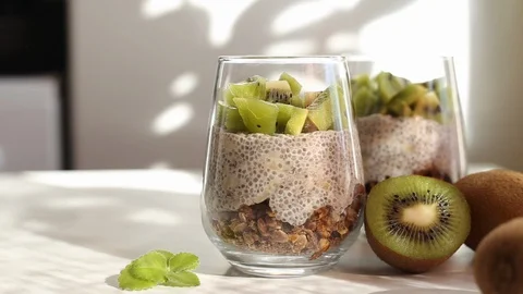 Making chia pudding with kiwi. Stock Footage 128347241