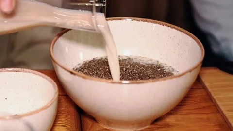 Making chia pudding with strawberries Stock Footage 241797561