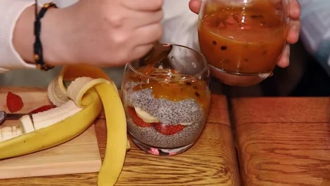 Making chia pudding with strawberries Stock Footage 241797773