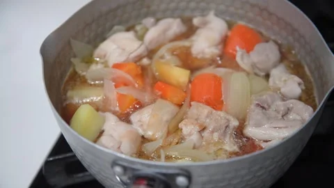 Making chicken and potato stew Stock Footage 331903319