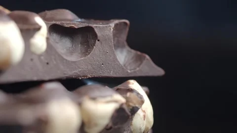 Making chocolate bars with nuts and cocoa Stock Footage 326290385
