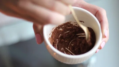 Making of chocolate body mask, mixing ingredients for diy cosmetics recipe at Stock Footage 124220249