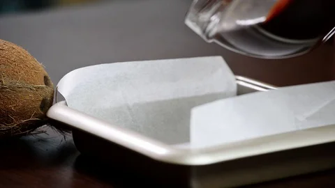 Making Chocolate Brownie Cake. Pouring Melting Chocolate Stock Footage