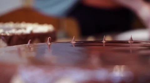 Making a chocolate cake. Almost done. Finishing touches Stock Footage 67880615