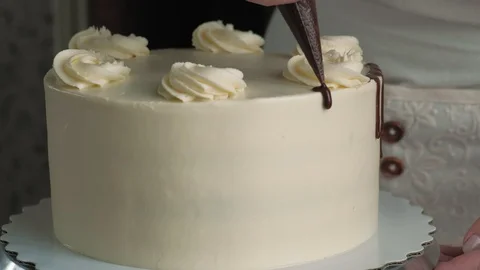 Making a chocolate cake. Confectioner work Stock Footage 127805072