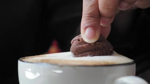 Making a chocolate cookie for coffee drink Stock Footage 340727048