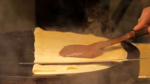 Making a chocolate crepe in Paris - close up shot Stock Footage 113515862