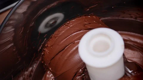 Making chocolate on a machine, melanger. Stop and turn on the machine.Food co Stock Footage 123687988