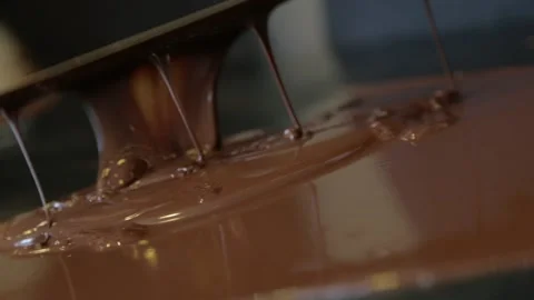 Making chocolate phase luquid chocolate Stock Footage 229718874