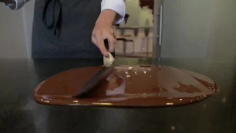 Making chocolate phase luquid chocolate Stock Footage 229718881