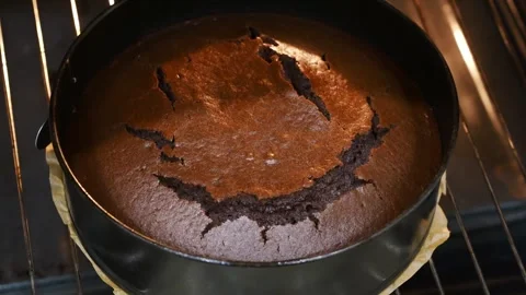 Making chocolate sponge cake in the oven with each step shown clearly Stock Footage 329968158