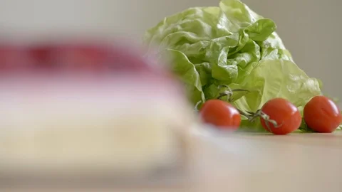 Making choice of sweets or healthy food, cake or vegetables Stock Footage 100198704