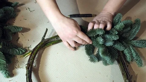 Making a Christmas wreath Stock Footage 168329951