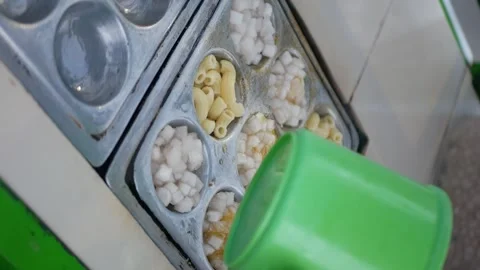 Making cilor, made from tapioca flour with macaroni and egg.Cilor is an Ind.. Stock-Footage 308648915