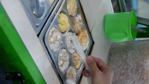 Making cilor, made from tapioca flour with macaroni and egg.Cilor is an Ind.. Stock Footage 308649011