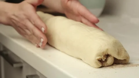 Making cinnamon buns Stock Footage 280026396