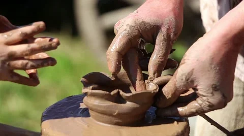 Making clay pottery, hands on wheel close up process Stock Footage 53222863