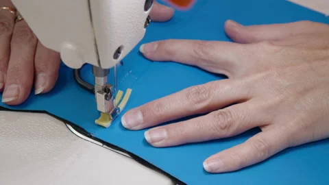 Making clothes on a sewing machine Stock Footage 159409328