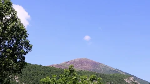 Making clouds over the magical mountain Stock Footage 311381539