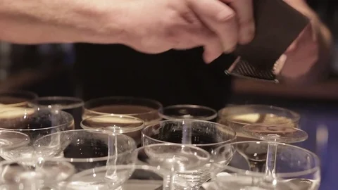 Making a Cocktail - Adding Grated Chocolate Stock Footage 77033820