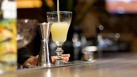 Making a cocktail bartender Stock Footage 102700249