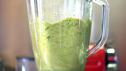 Making a cocktail in a blender close-up Stock Footage 128118506