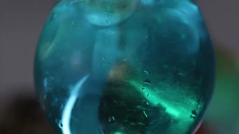 Making a cocktail. close-up. The bartender mixes all the ingredients and ice Stock Footage 230559442