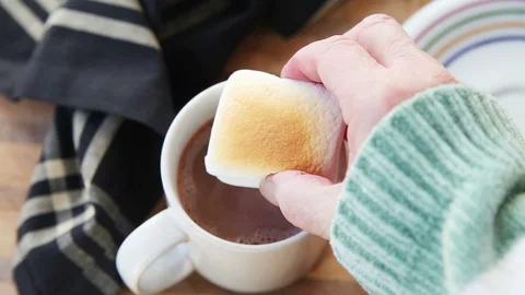 Making cocoa with giant marshmallow Stock Footage 102740282