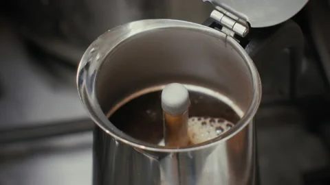 Making Coffe with an Italian Coffe Machine - Coffee Ready Stock Footage 141392035