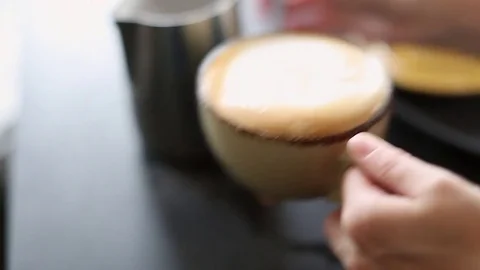 Making a Coffee - Adding the Steamed Milk Stock Footage 77225808