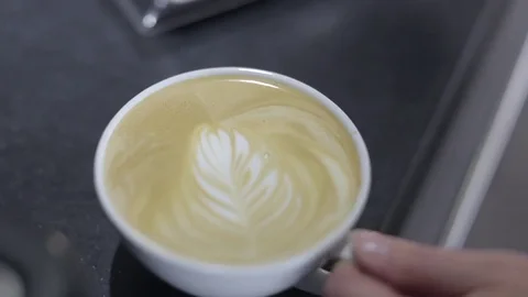 Making a Coffee - Adding the Steamed Milk Stock Footage 77225826
