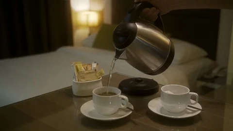 Making Coffee and Tea in Hotel Room Stock Footage 114228795