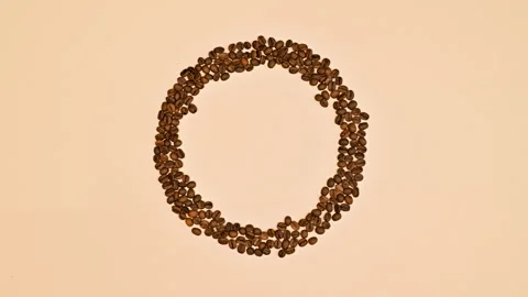 Making coffee beans shape and copy space circle. Stop motion Видео 232151209