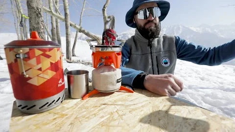 Making coffee in Cezve at winter mountains Stock Footage 171231024