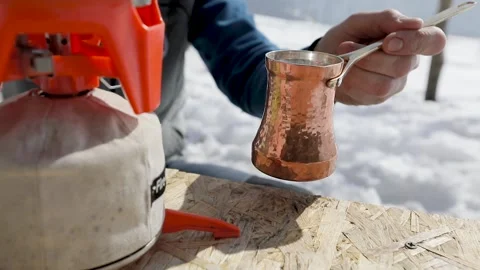 Making coffee in Cezve at winter mountains Stock Footage 171231389
