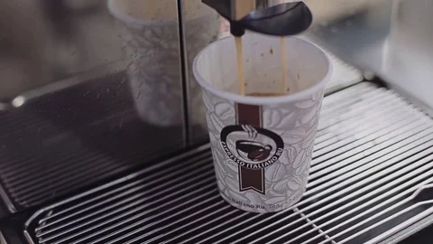Making coffee in a coffee machine in a cafe. Stock Footage
