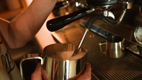 Making coffee on the coffee machine 動画素材 149945615