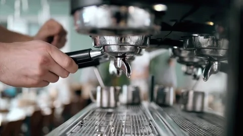 Making coffee in the coffee machine. Fresh espresso. Man prepare coffee. Barista Stock Footage