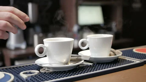 Making coffee. Coffee for two. Coffee maker - professional coffee machine . Stock Footage 108771901
