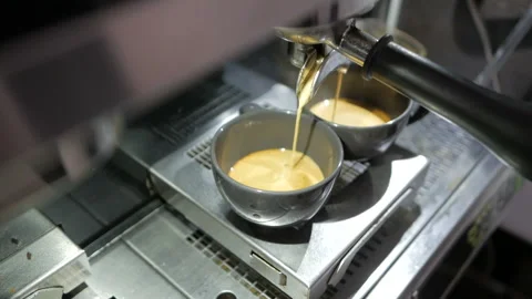 Making coffee. Coffee for two. Coffee maker - professional coffee machine. Stock Footage 108773198